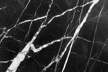 Elegant black marble surface with white veining, ideal for backgrounds or textures in design