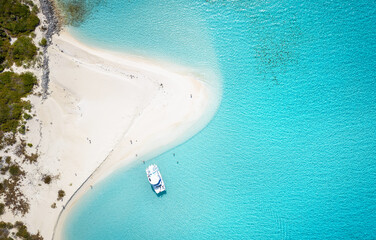 Aerial overhead view of the beautiful beaches in Exuma islands, Bahamas, Caribbean, with clear,...