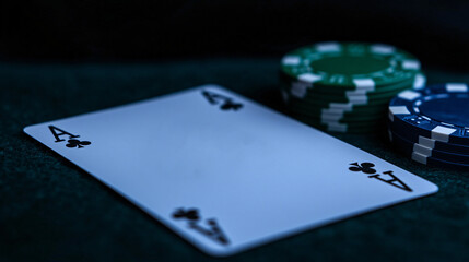 Ace of Spades with poker chips: An Ace of Spades card lies on a green poker table, flanked by stacks of colorful chips, creating an atmosphere of anticipation and chance.