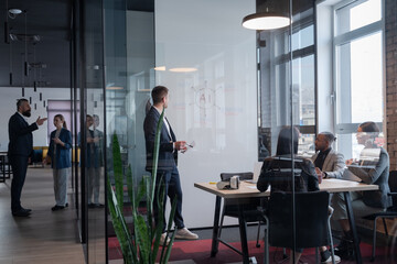 Modern office meeting with diverse professionals discussing artificial intelligence strategy....