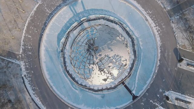 Aerial view of The Unisphere in Flushing Meadows Corona Park. Shot on a winter morning in Queens, New York City.