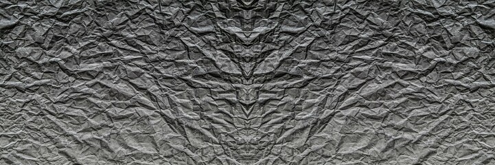 Mur gris foncé au style froissé et granuleux, avec effet symétrique	