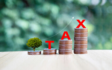 Tax increase concept. tax icon on coins. increasing taxes, Pay online income tax. income tax system icon around on wood floor background.
