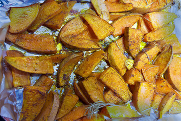 Pieces of sweet potato tubers baked in foil, top view