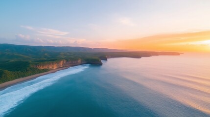 Fototapeta premium Sunset over a serene coastline with lush green hills and gentle waves in the evening sky