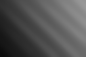 Abstract background with gradients of gray tones and diagonal texture pattern