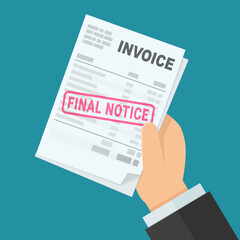 A hand holds an unpaid bill with a red 