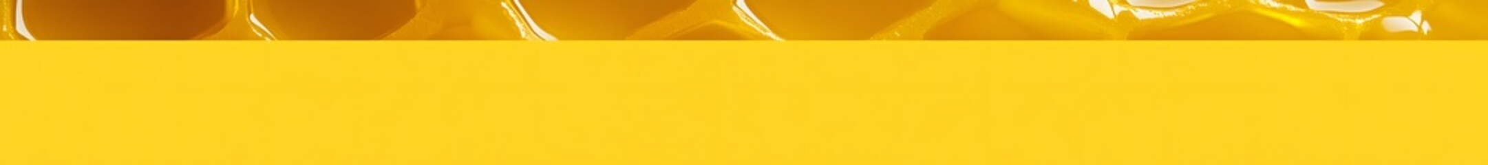 Several transparent glasses sitting on a bright yellow surface