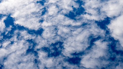 Obraz premium pattern blue day sky with white clouds