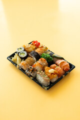 Takeaway food. Set of sushi in plastic container