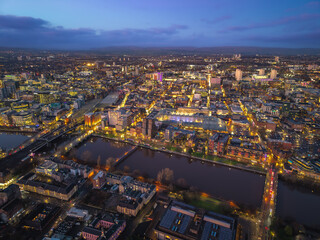 Night drone aerial drone illuminated downtown Glasgow city Scotland