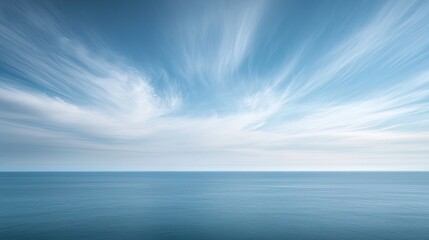 A clear light blue sky stretching endlessly, evoking a sense of calm and tranquility.