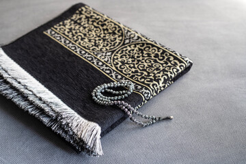 Prayer rug and rosary used for worship in Islam