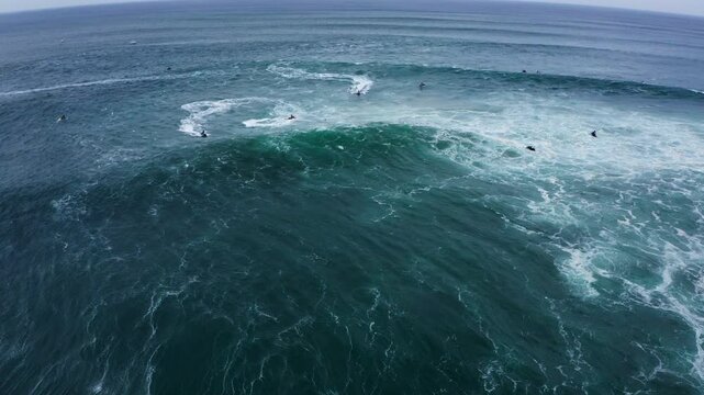 4K video of Huge Atlantic ocean waves during international surfers challenge at Praia do Norte in Nazare, Farol da Nazar&eacute;, Portugal where Guinness World Record for highest surfing was set. 