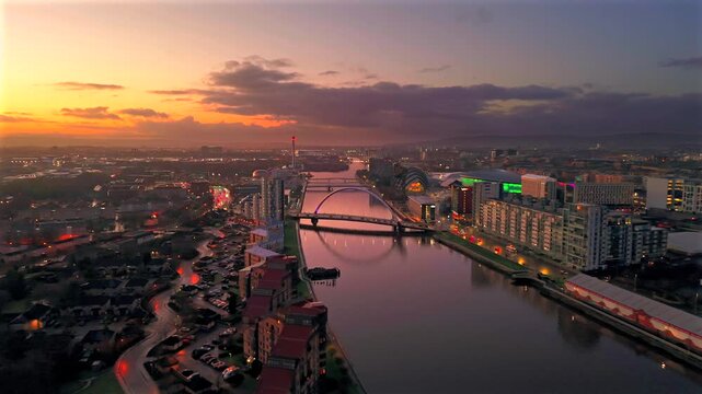 Aerial Clyde river Glasgow with Arc bridge, armadillo convention center and millenium