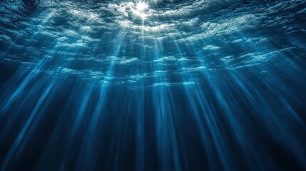 Underwater sunbeams, ocean depth, cloudy sky, tranquil scene, background texture
