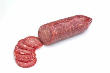 Sliced salami on white background.