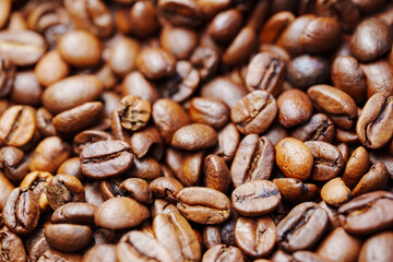 beans of roasted natural coffee. coffee background and texture. Aromatic invigorating drink.