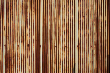 茶色く錆びた古いトタン板・金属素材の背景（背景テクスチャーシリーズ）