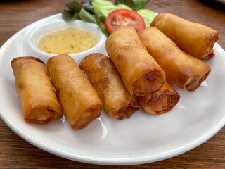 Vegetable spring rolls served with sweet plum sauce