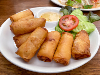 Vegetable spring rolls served with sweet plum sauce