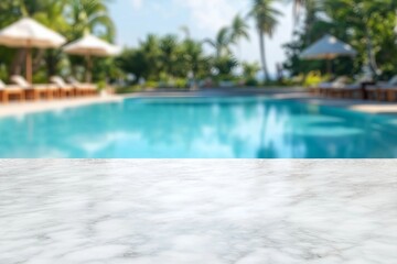 Empty white marble stone table top and blurred swimming pool in tropical resort in summer banner background can used for display or montage your products.