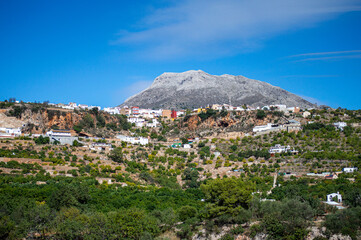 Panoramic view on picturesque typical Spanish village with cozy white houses in Yunquera,...