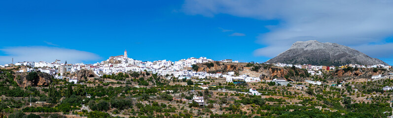 Panoramic view on picturesque typical Spanish village with cozy white houses in Yunquera, Andalusia, Spain