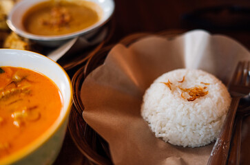 Traditional White Rice with Fried Shallots Served on Banana Leaf in Lombok
