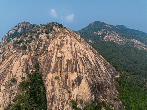 Breathtaking aerial view of Pakhi Pahar, Purulia, with colorful bird murals against rolling hills, capturing the essence of West Bengal&rsquo;s rich heritage.