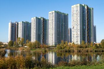 Fototapeta premium View of the buildings of the modern multi-story residential complex on a sunny October day