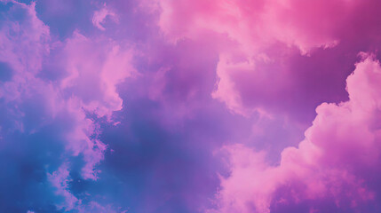 Fototapeta premium Vibrant pink and purple cloudy sky texture for artistic backgrounds