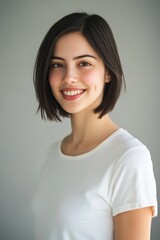 Portrait of young woman smiling in white t-shirt, natural light, relaxed mood, joyful expression, fresh beauty, confidence, lifestyle photography, charming personality.