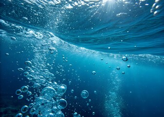Obraz premium Underwater closeup photography showcasing the bubbles and ripples created by movement in the deep blue ocean water