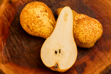 pears on a piece of wood in the kitchen