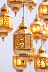 Fototapeta premium Multiple decorative lanterns hanging in a row with intricate designs.