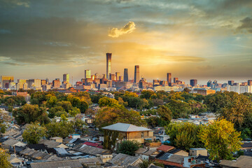 In Beijing, China, traditional dwellings and modern high-rise buildings make an interesting...