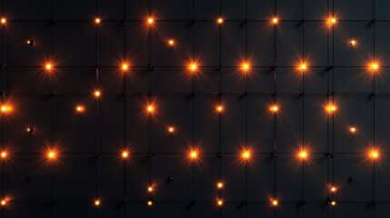 A Dark Wall Decorated With Lit Orange Colored Lights