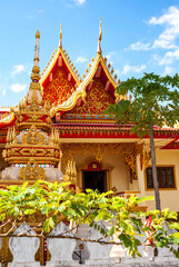 Colorful golden Buddhist temple in Vientiane, Laos, Asia