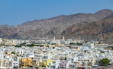 Obraz premium Panoramic view of Muscat with traditional white houses, Omani architecture