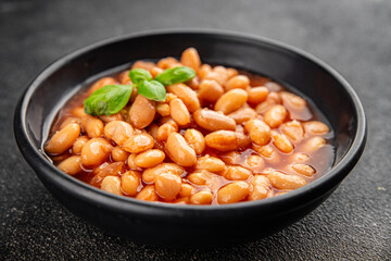 White bean tomato sauce delicious gourmet food background on the table rustic food top view copy space keto and paleo diet vegetarian and vegan food