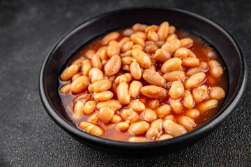 White bean tomato sauce delicious gourmet food background on the table rustic food top view copy space keto and paleo diet vegetarian and vegan food