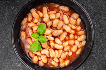 White bean tomato sauce delicious gourmet food background on the table rustic food top view copy space keto and paleo diet vegetarian and vegan food