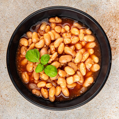 White bean tomato sauce delicious gourmet food background on the table rustic food top view copy space keto and paleo diet vegetarian and vegan food