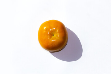 It is Persimmon lying on a white background
