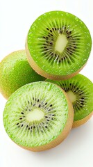 Fototapeta premium Fresh Kiwi Slices on White Background – Juicy Kiwi with Vibrant Green Color – Isolated Kiwi for High-Quality Fruit Photography.