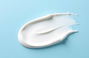 cosmetic smears of creamy texture on a blue background