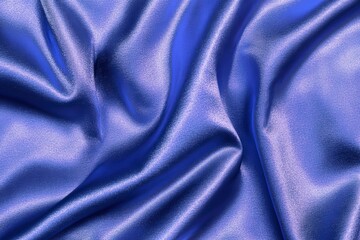 Fototapeta premium Smooth and shiny blue satin fabric with elegant folds
