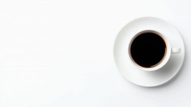 A top-down view of a simple, elegant cup of black coffee on a plate against a plain white background, Ideal for articles or designs related to coffee culture, relaxation, or morning routines,