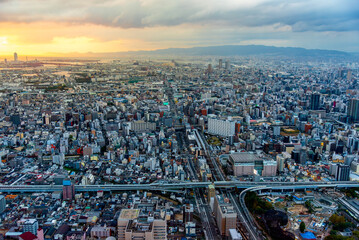 Fototapeta premium Osaka city Japan view from above at sunset, Osaka skyline in twilight light.